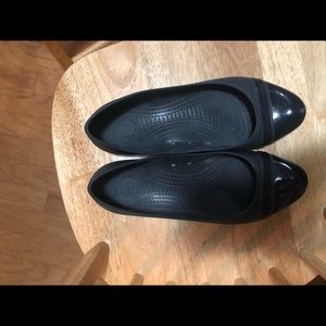 2 pairs of loved crocs! One black, one brown